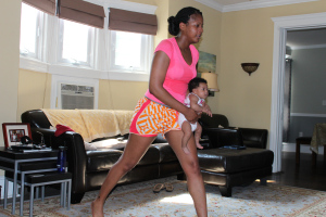 Tanya H. Franklin &amp; Quinn Franklin doing Happy Baby Workout